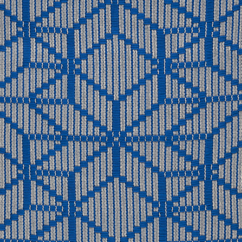 geometrikus mintájú kék szőnyeg